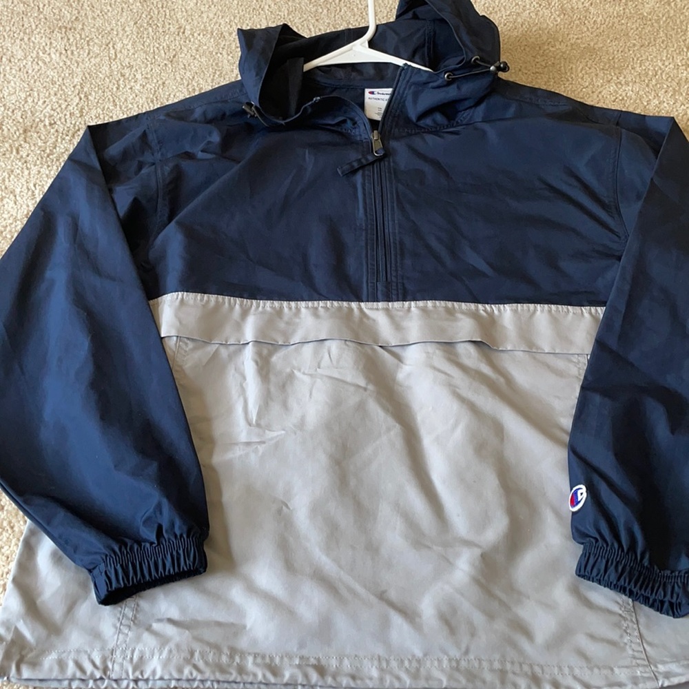 Grey and navy blue wind breaker